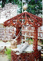 welded log chain wellhouse